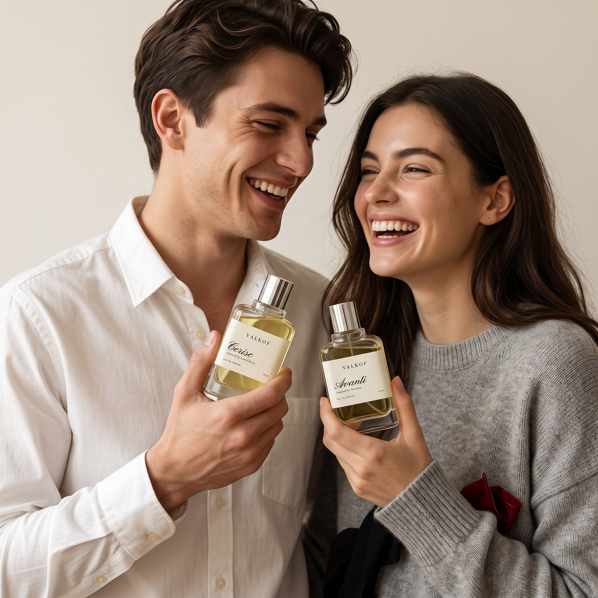 Couple holding VALKOF fragrances